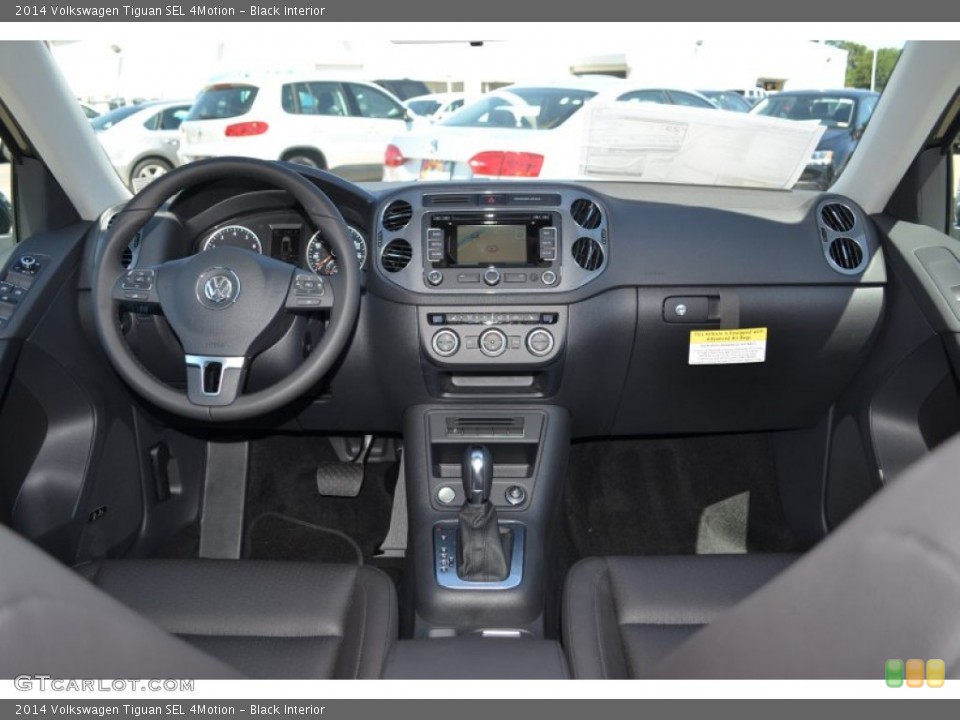 Black Interior Dashboard for the 2014 Volkswagen Tiguan SEL 4Motion #94176268
