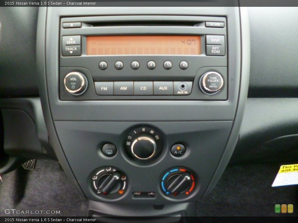 Charcoal Interior Controls for the 2015 Nissan Versa 1.6 S Sedan #94215100