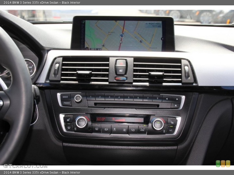 Black Interior Controls for the 2014 BMW 3 Series 335i xDrive Sedan #94243643