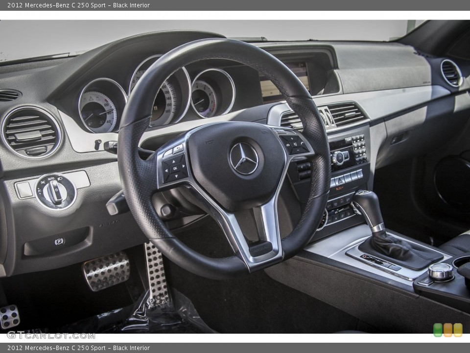 Black Interior Dashboard for the 2012 Mercedes-Benz C 250 Sport #94277321