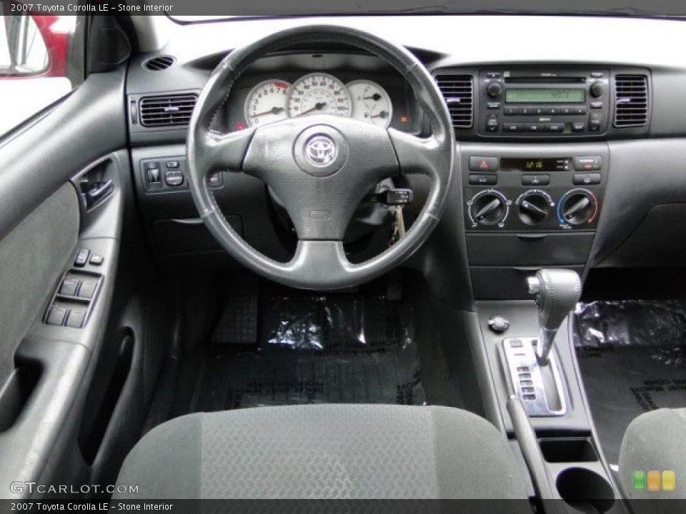Stone Interior Dashboard for the 2007 Toyota Corolla LE #94410314
