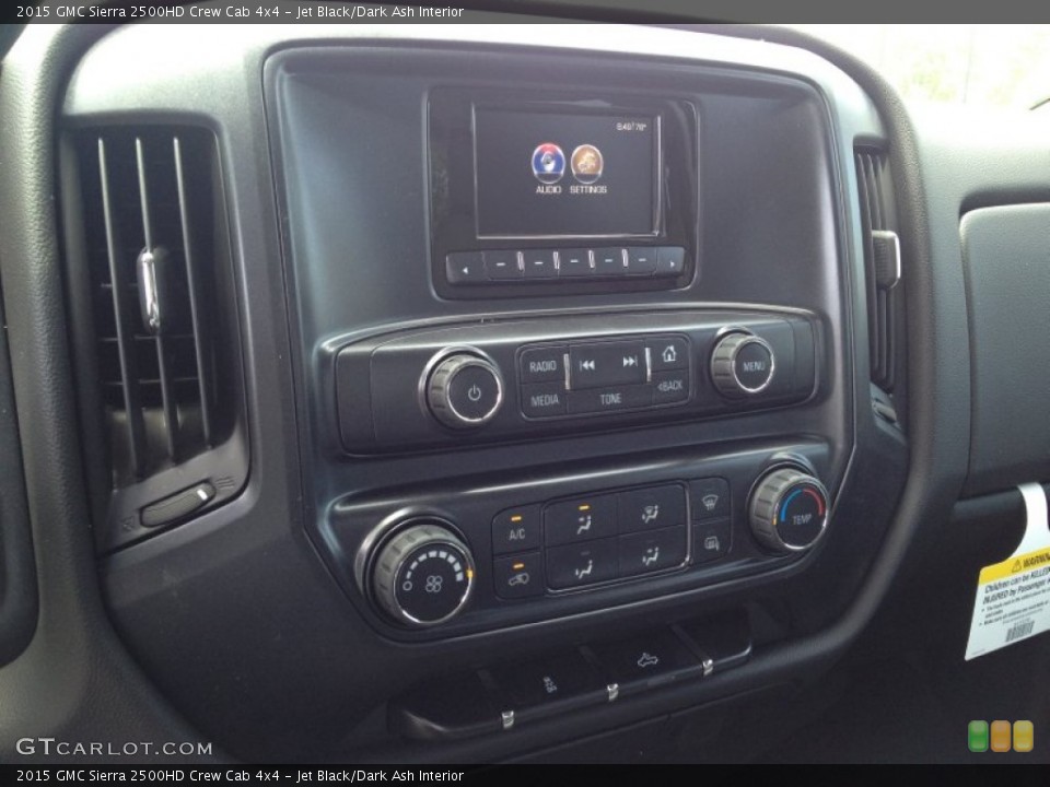 Jet Black/Dark Ash Interior Controls for the 2015 GMC Sierra 2500HD Crew Cab 4x4 #94463608
