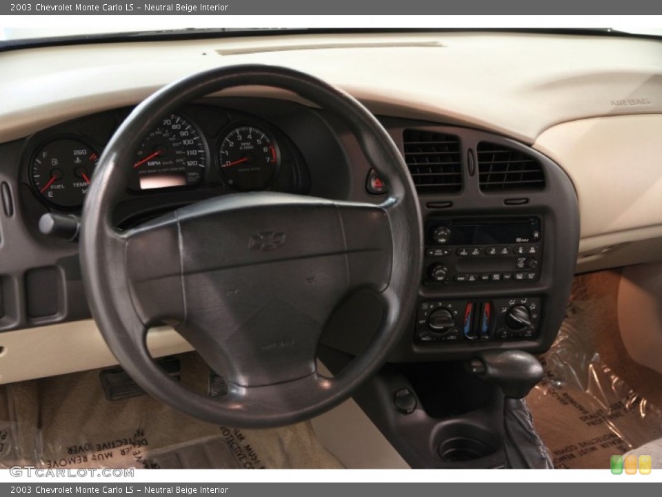 Neutral Beige Interior Dashboard for the 2003 Chevrolet Monte Carlo LS #94524526