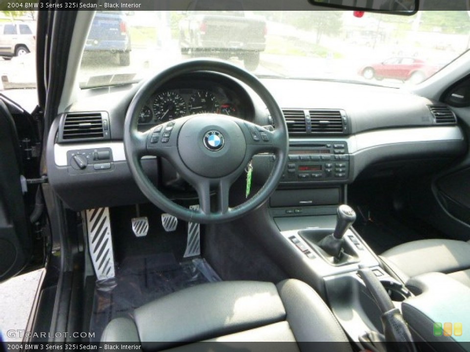 Black Interior Prime Interior for the 2004 BMW 3 Series 325i Sedan #94537992