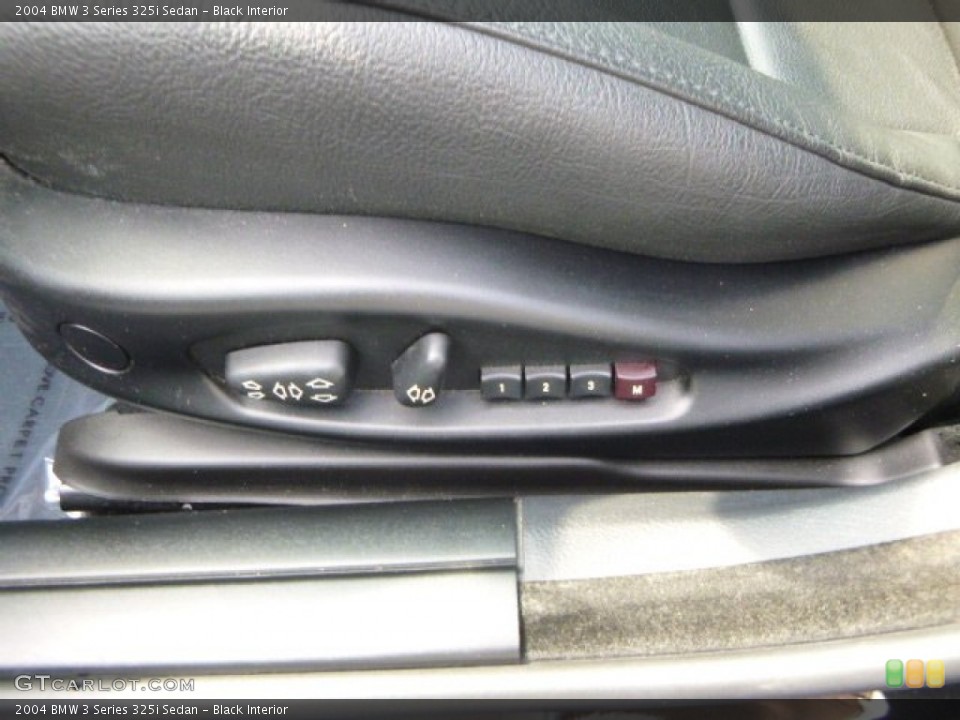 Black Interior Controls for the 2004 BMW 3 Series 325i Sedan #94538043