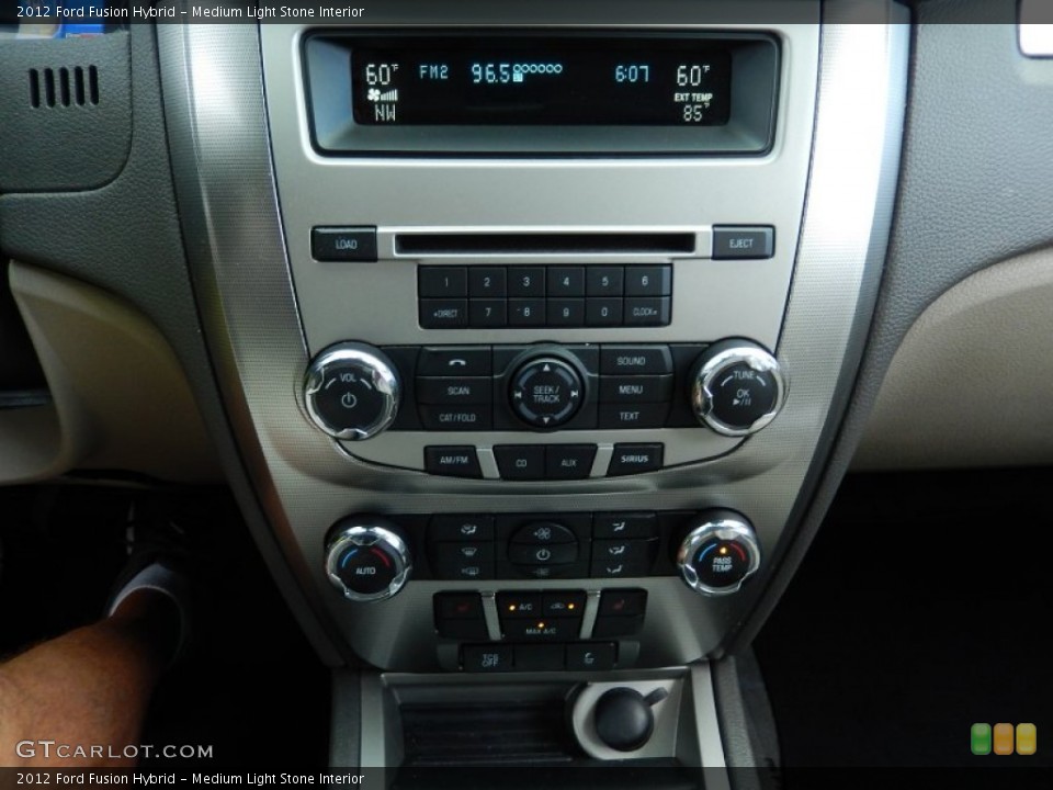 Medium Light Stone Interior Controls for the 2012 Ford Fusion Hybrid #94577698