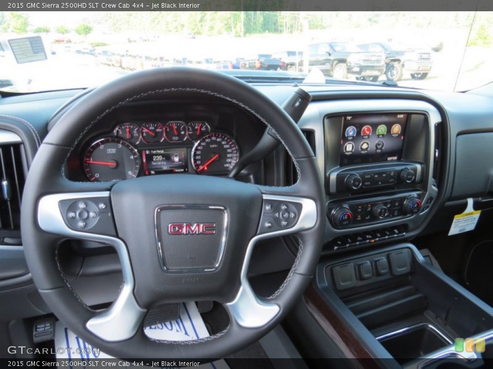 Jet Black Interior Steering Wheel for the 2015 GMC Sierra 2500HD SLT Crew Cab 4x4 #94624585