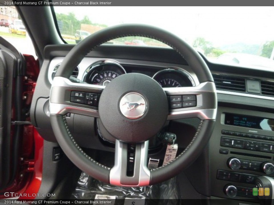 Charcoal Black Interior Steering Wheel for the 2014 Ford Mustang GT Premium Coupe #94704054