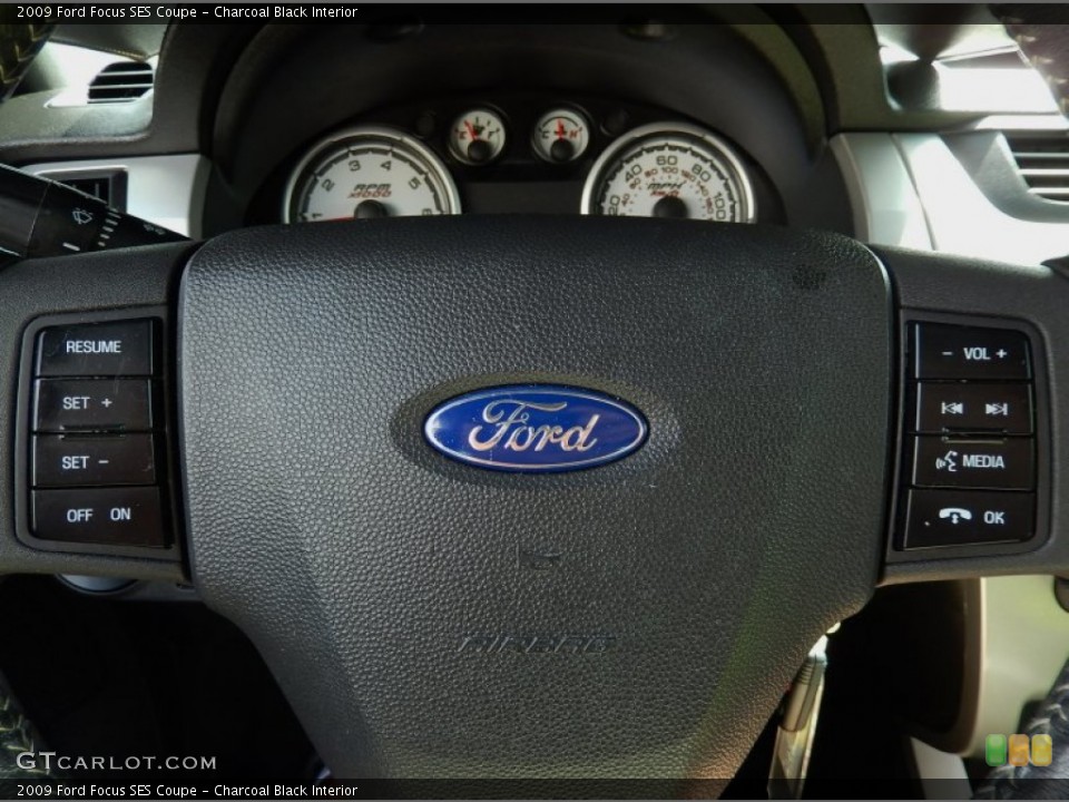 Charcoal Black Interior Steering Wheel for the 2009 Ford Focus SES Coupe #94739431