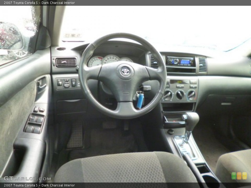 Dark Charcoal Interior Dashboard for the 2007 Toyota Corolla S #94779852