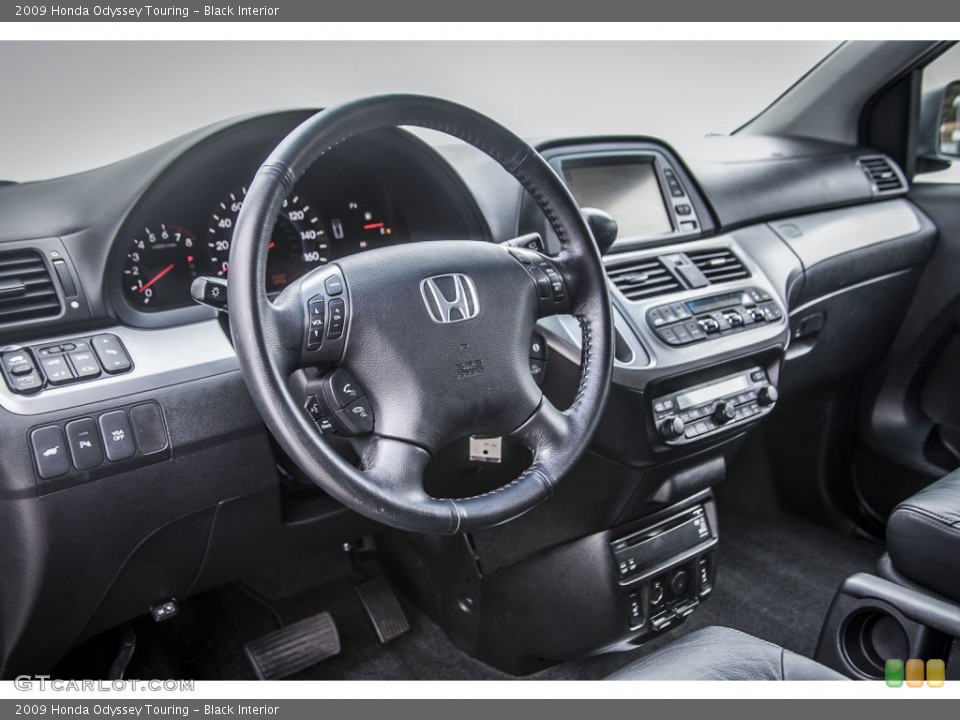 Black Interior Dashboard for the 2009 Honda Odyssey Touring #94962557