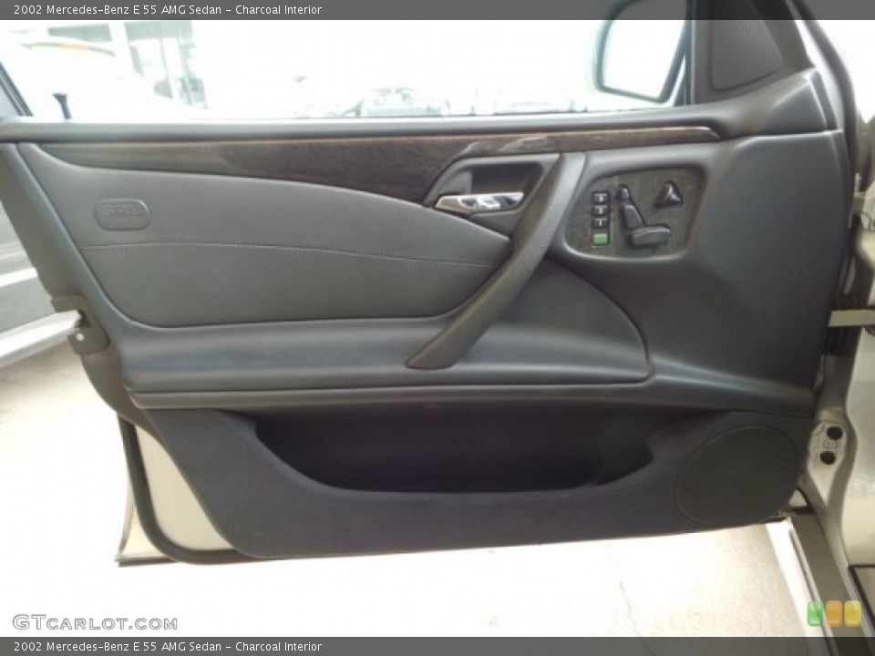 Charcoal Interior Door Panel for the 2002 Mercedes-Benz E 55 AMG Sedan #95017279