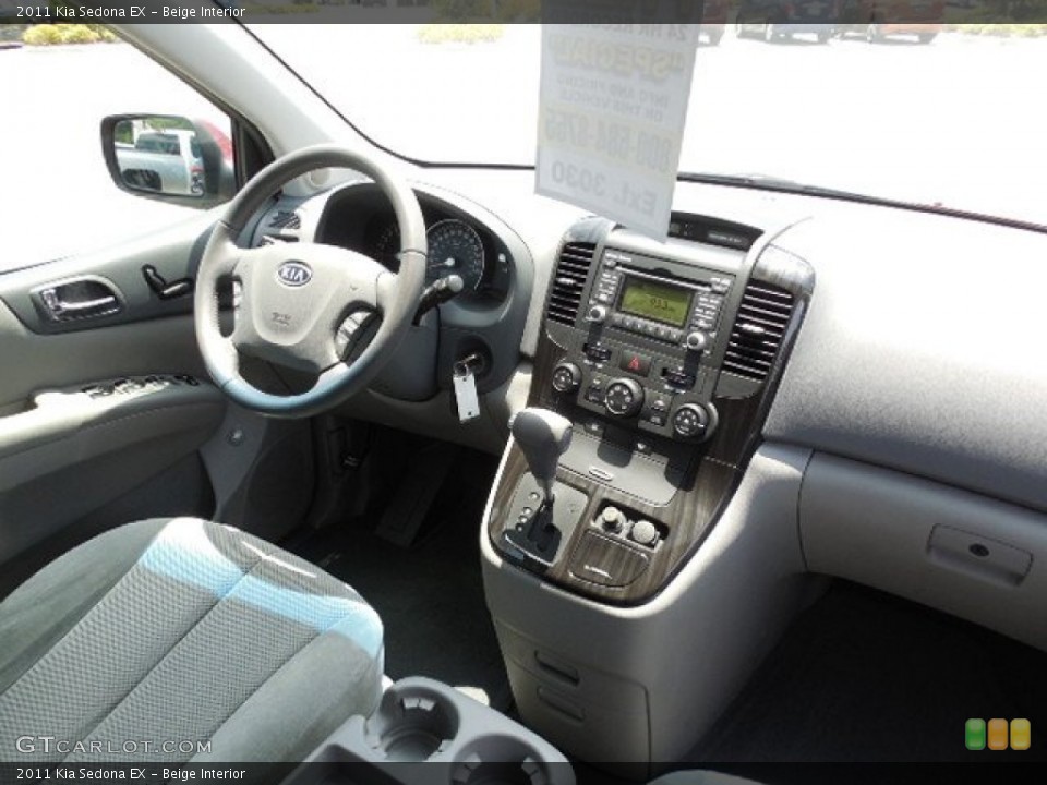 Beige Interior Dashboard for the 2011 Kia Sedona EX #95022034