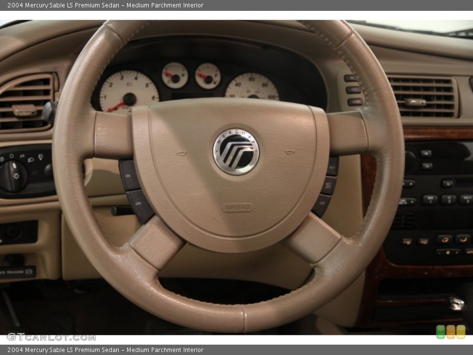 Medium Parchment Interior Steering Wheel for the 2004 Mercury Sable LS Premium Sedan #95022418