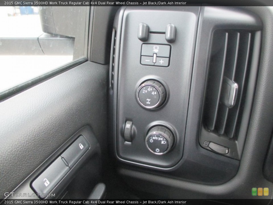 Jet Black/Dark Ash Interior Controls for the 2015 GMC Sierra 3500HD Work Truck Regular Cab 4x4 Dual Rear Wheel Chassis #95077560