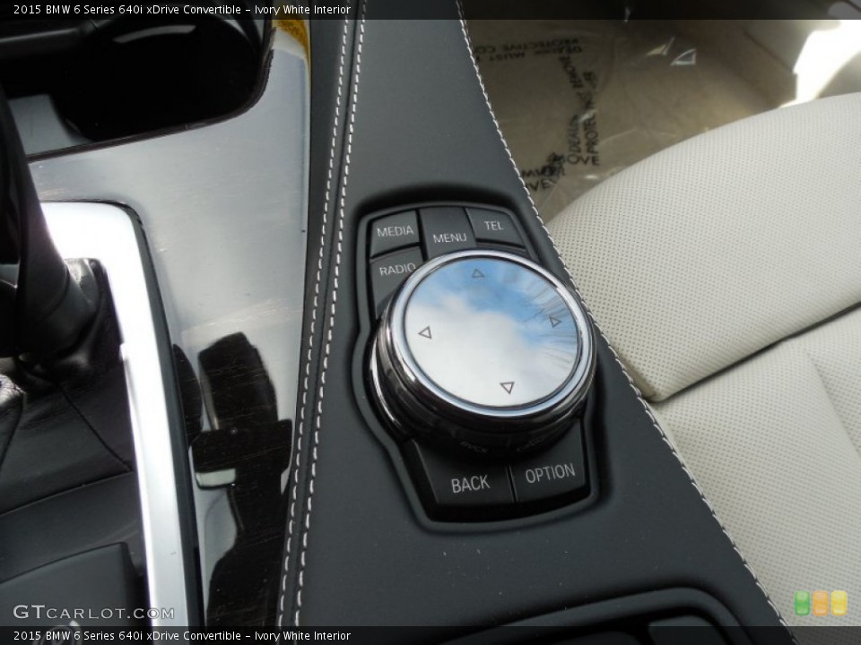 Ivory White Interior Controls for the 2015 BMW 6 Series 640i xDrive Convertible #95130959