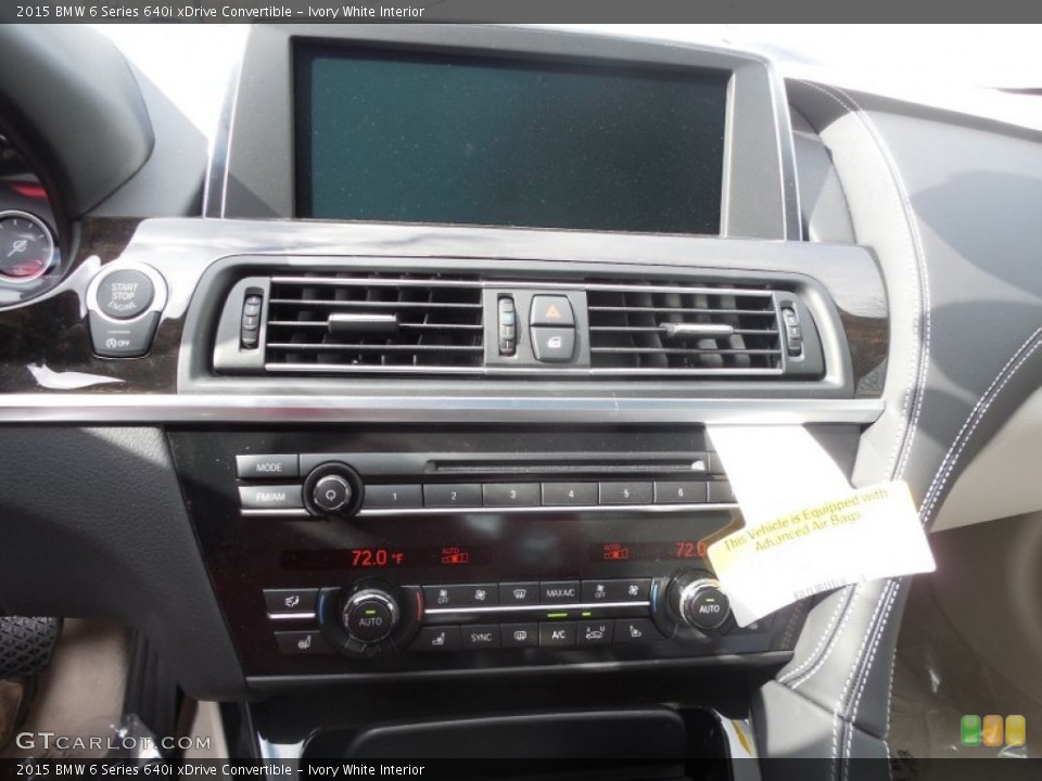 Ivory White Interior Controls for the 2015 BMW 6 Series 640i xDrive Convertible #95130986