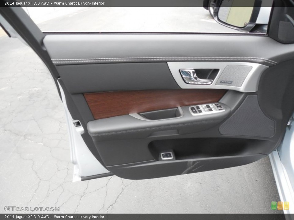 Warm Charcoal/Ivory Interior Door Panel for the 2014 Jaguar XF 3.0 AWD #95132300