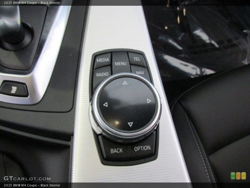 Black Interior Controls for the 2015 BMW M4 Coupe #95142095