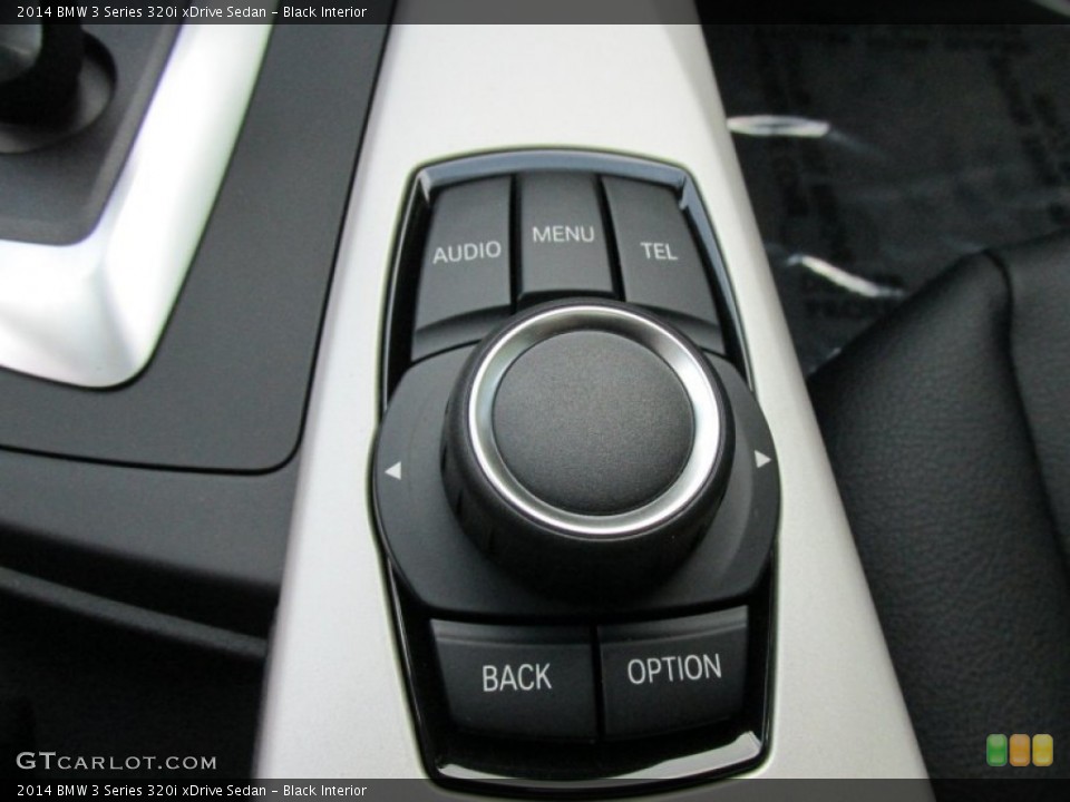 Black Interior Controls for the 2014 BMW 3 Series 320i xDrive Sedan #95142656