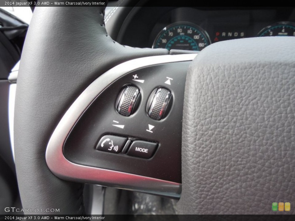 Warm Charcoal/Ivory Interior Controls for the 2014 Jaguar XF 3.0 AWD #95147318