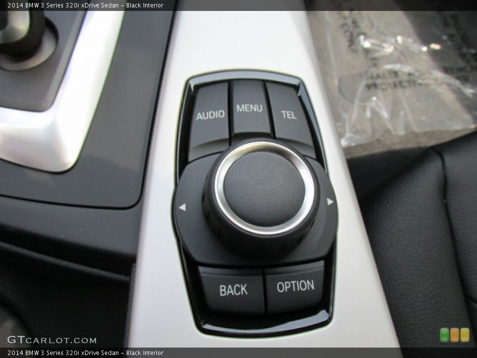 Black Interior Controls for the 2014 BMW 3 Series 320i xDrive Sedan #95148404