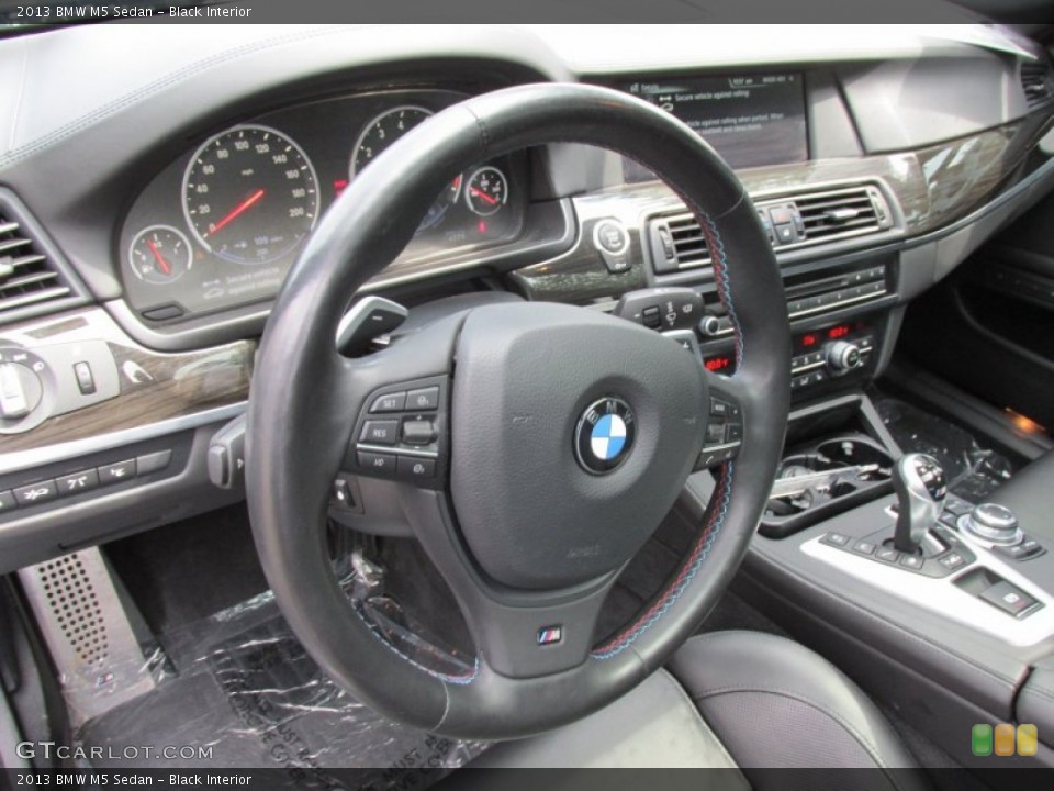 Black Interior Dashboard for the 2013 BMW M5 Sedan #95152214
