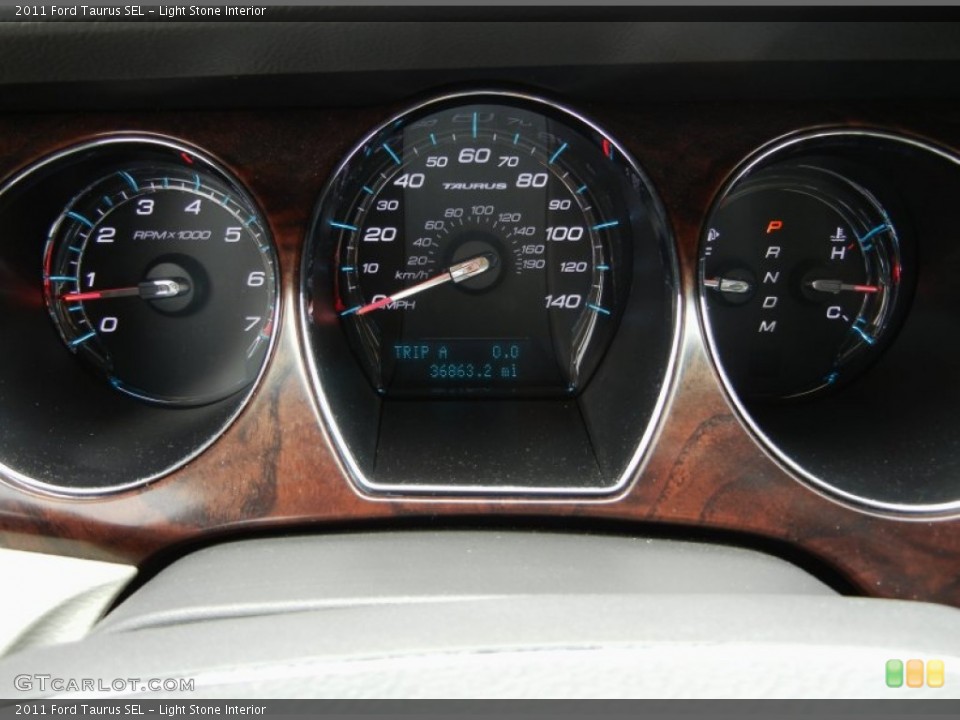 Light Stone Interior Gauges for the 2011 Ford Taurus SEL #95316574