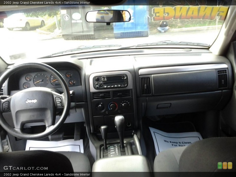 Sandstone Interior Dashboard for the 2002 Jeep Grand Cherokee Laredo 4x4 #95316729