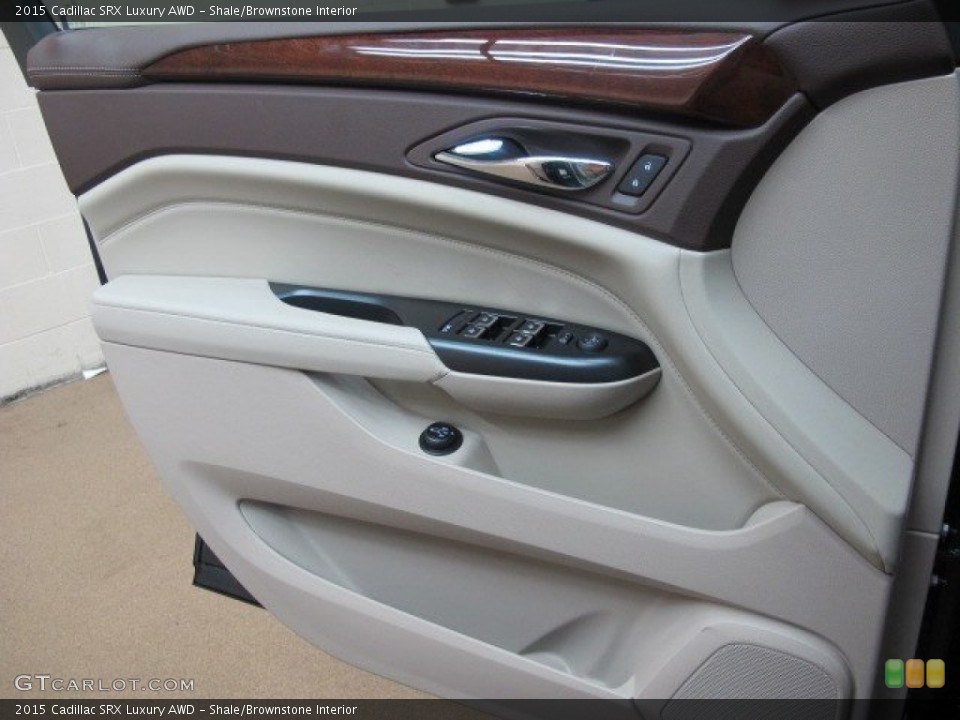 Shale/Brownstone Interior Door Panel for the 2015 Cadillac SRX Luxury AWD #95345638