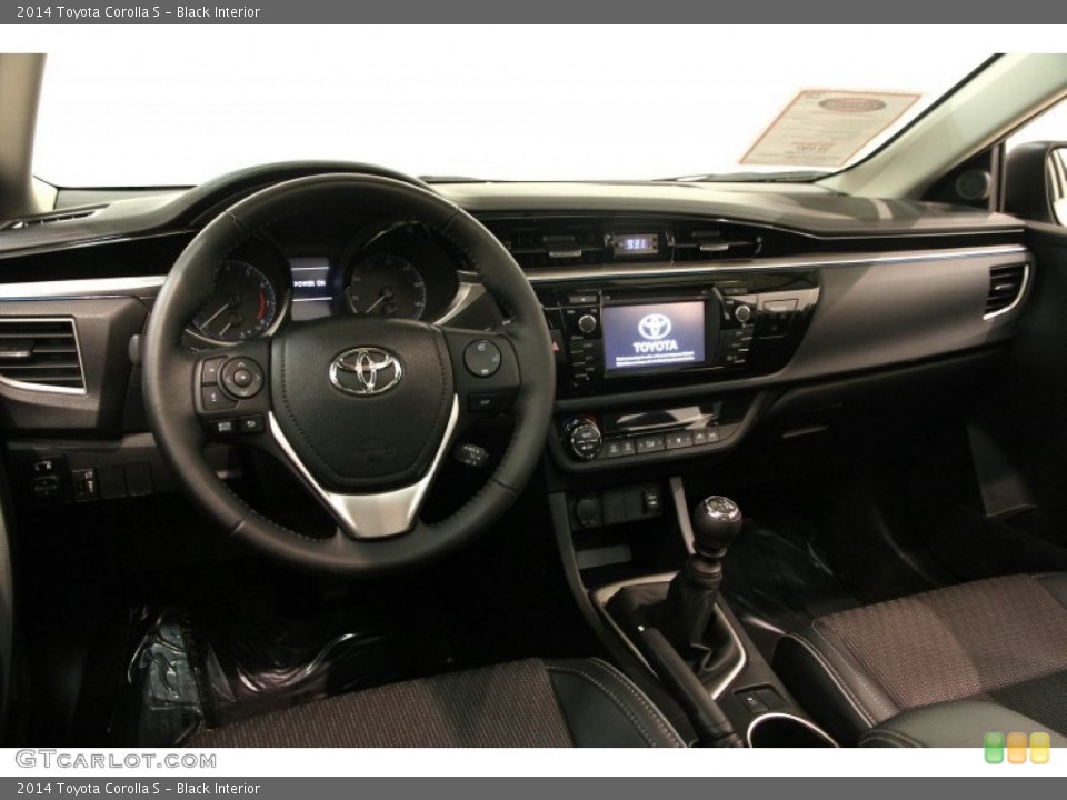 Black Interior Dashboard for the 2014 Toyota Corolla S #95400230