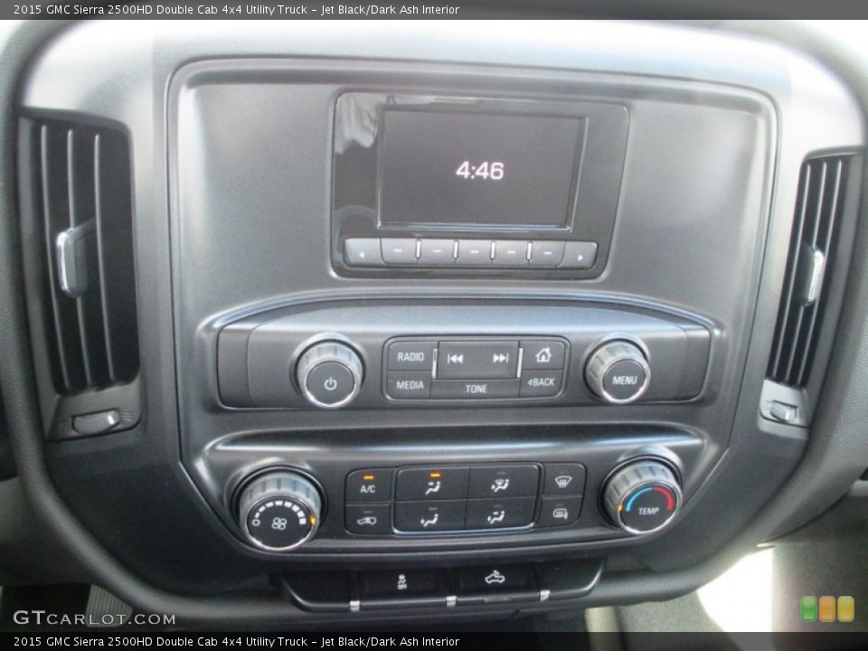Jet Black/Dark Ash Interior Controls for the 2015 GMC Sierra 2500HD Double Cab 4x4 Utility Truck #95414582