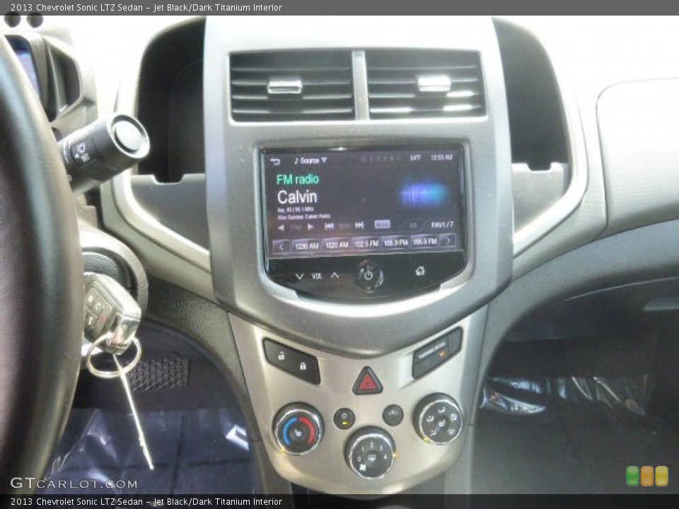 Jet Black/Dark Titanium Interior Controls for the 2013 Chevrolet Sonic LTZ Sedan #95473376