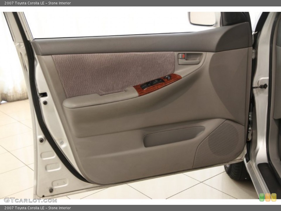 Stone Interior Door Panel for the 2007 Toyota Corolla LE #95618624