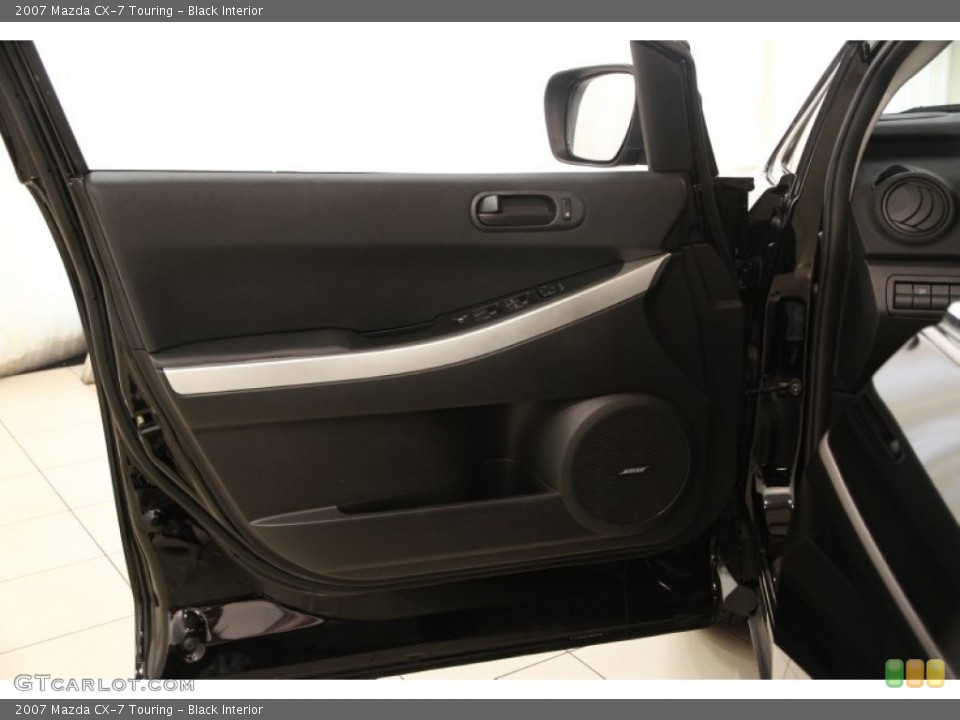 Black Interior Door Panel for the 2007 Mazda CX-7 Touring #95636441