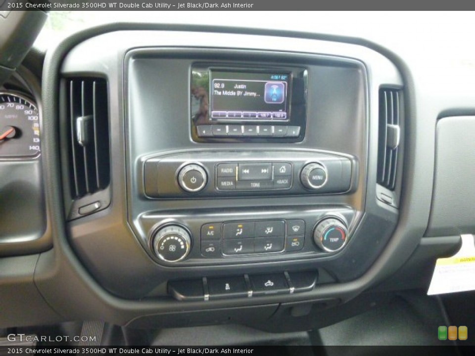 Jet Black/Dark Ash Interior Controls for the 2015 Chevrolet Silverado 3500HD WT Double Cab Utility #95661703