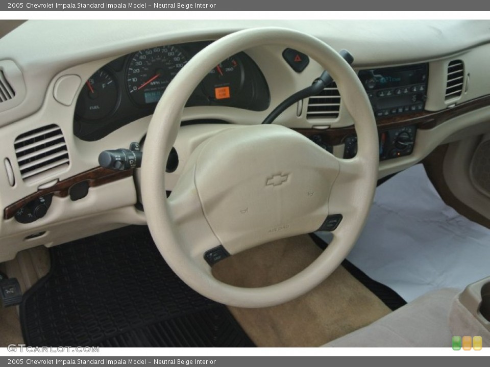 Neutral Beige Interior Steering Wheel for the 2005 Chevrolet Impala  #95706227