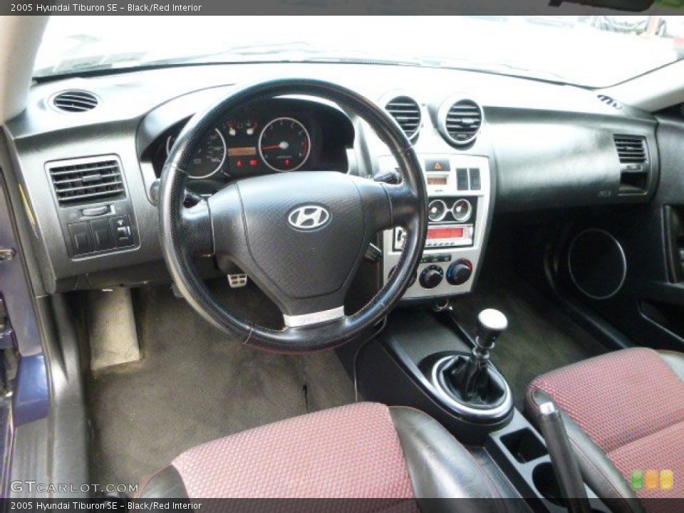Black/Red Interior Photo for the 2005 Hyundai Tiburon SE #95710595