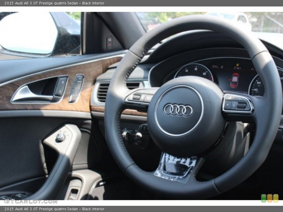 Black Interior Steering Wheel for the 2015 Audi A6 3.0T Prestige quattro Sedan #95765493