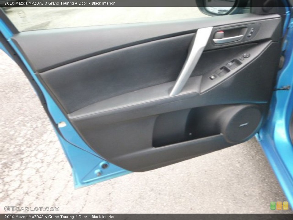 Black Interior Door Panel for the 2010 Mazda MAZDA3 s Grand Touring 4 Door #95812938