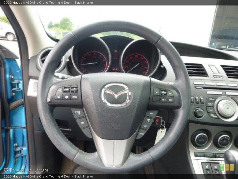Black Interior Steering Wheel for the 2010 Mazda MAZDA3 s Grand Touring 4 Door #95813229