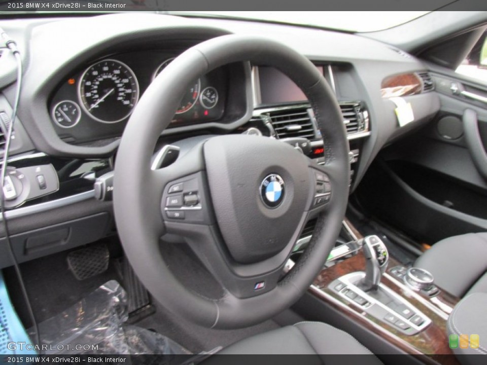 Black Interior Steering Wheel for the 2015 BMW X4 xDrive28i #95838934