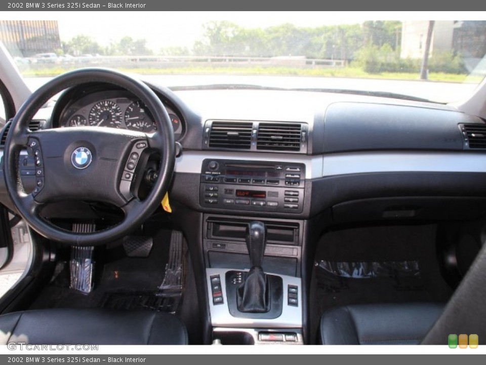 Black Interior Dashboard for the 2002 BMW 3 Series 325i Sedan #95884597