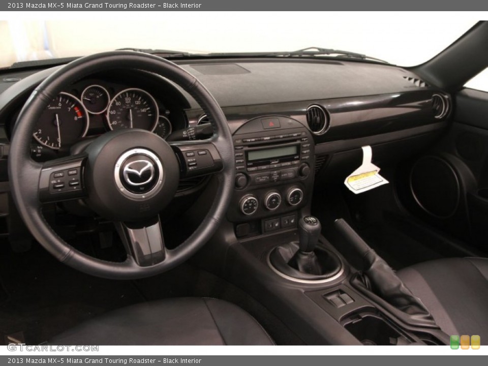 Black Interior Dashboard for the 2013 Mazda MX-5 Miata Grand Touring Roadster #95933155