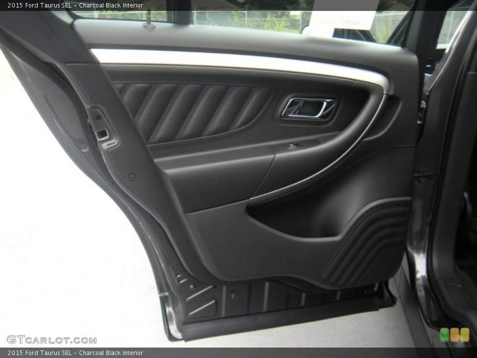 Charcoal Black Interior Door Panel for the 2015 Ford Taurus SEL #95982829