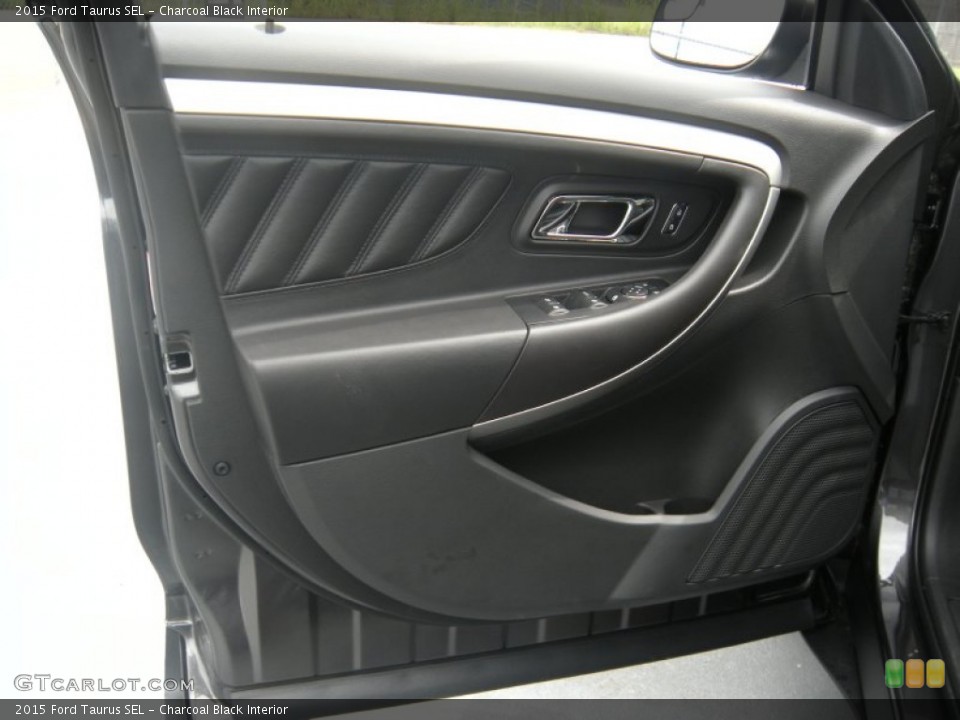 Charcoal Black Interior Door Panel for the 2015 Ford Taurus SEL #95982862