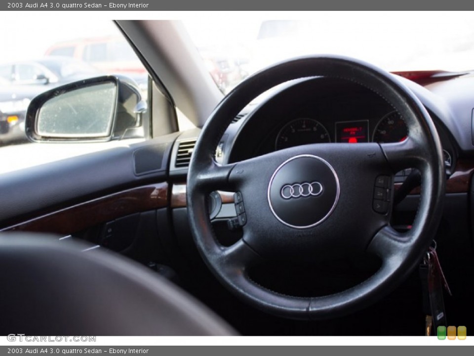 Ebony Interior Steering Wheel for the 2003 Audi A4 3.0 quattro Sedan #96374541