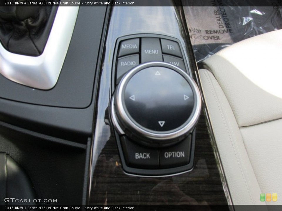 Ivory White and Black Interior Controls for the 2015 BMW 4 Series 435i xDrive Gran Coupe #96481555