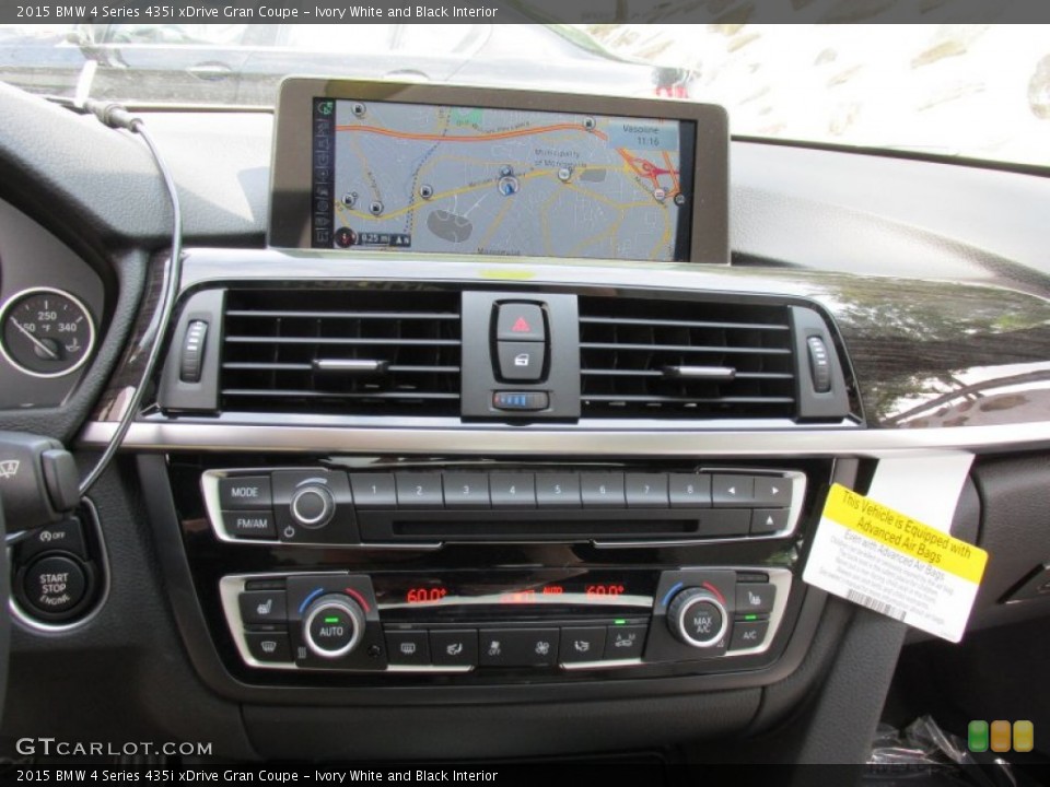 Ivory White and Black Interior Controls for the 2015 BMW 4 Series 435i xDrive Gran Coupe #96481576
