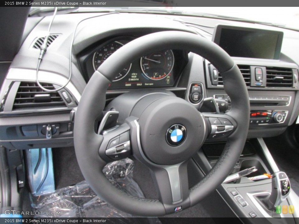 Black Interior Steering Wheel for the 2015 BMW 2 Series M235i xDrive Coupe #96555416